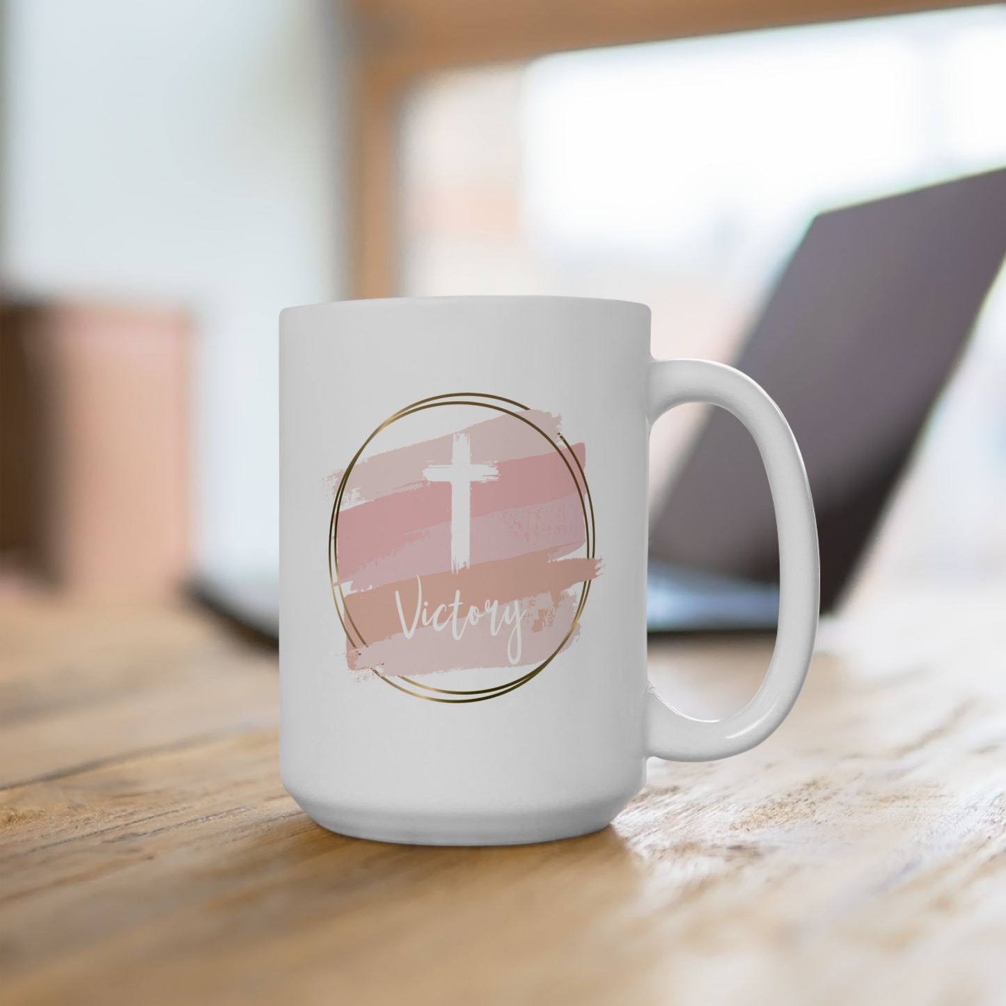 Christian ceramic coffee mug with the word Victory and a cross on a watercolor background